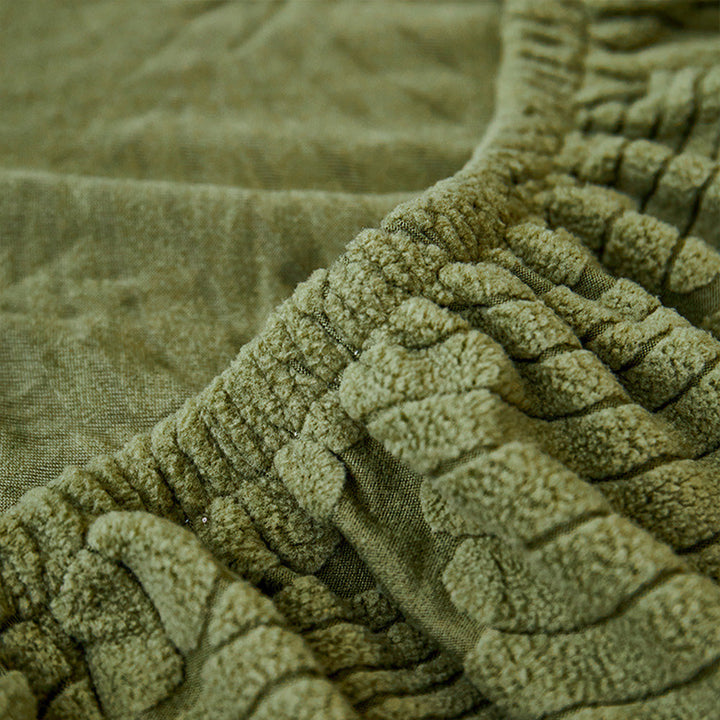 Flexible stretch sofa cover showcasing a beautiful leaf design, enhancing any home decor.