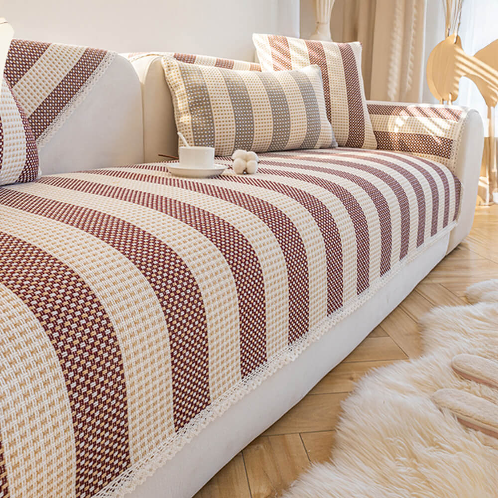 Stylish striped couch cover in cotton linen, offering anti-scratch furniture protection, pet-friendly.