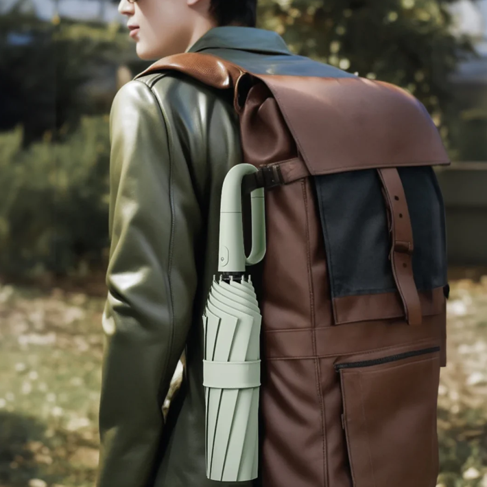 "Sturmsicherer, kompakter Regenschirm mit reflektierender Kante für Sichtbarkeit bei Dunkelheit, ideal für stürmisches Wetter