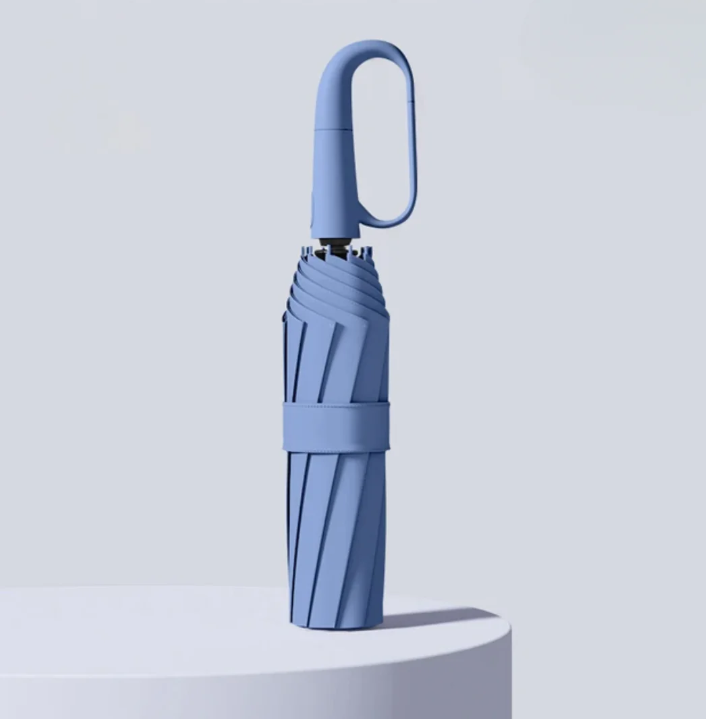 "Sturmsicherer, kompakter Regenschirm mit reflektierender Kante für Sichtbarkeit bei Dunkelheit, ideal für stürmisches Wetter