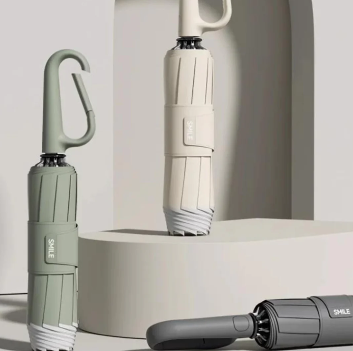 "Sturmsicherer, kompakter Regenschirm mit reflektierender Kante für Sichtbarkeit bei Dunkelheit, ideal für stürmisches Wetter