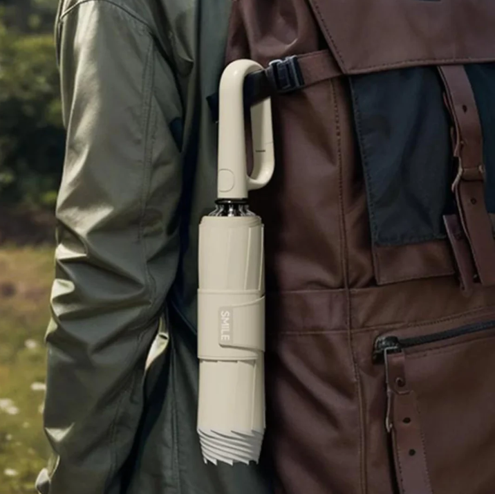 "Sturmsicherer, kompakter Regenschirm mit reflektierender Kante für Sichtbarkeit bei Dunkelheit, ideal für stürmisches Wetter