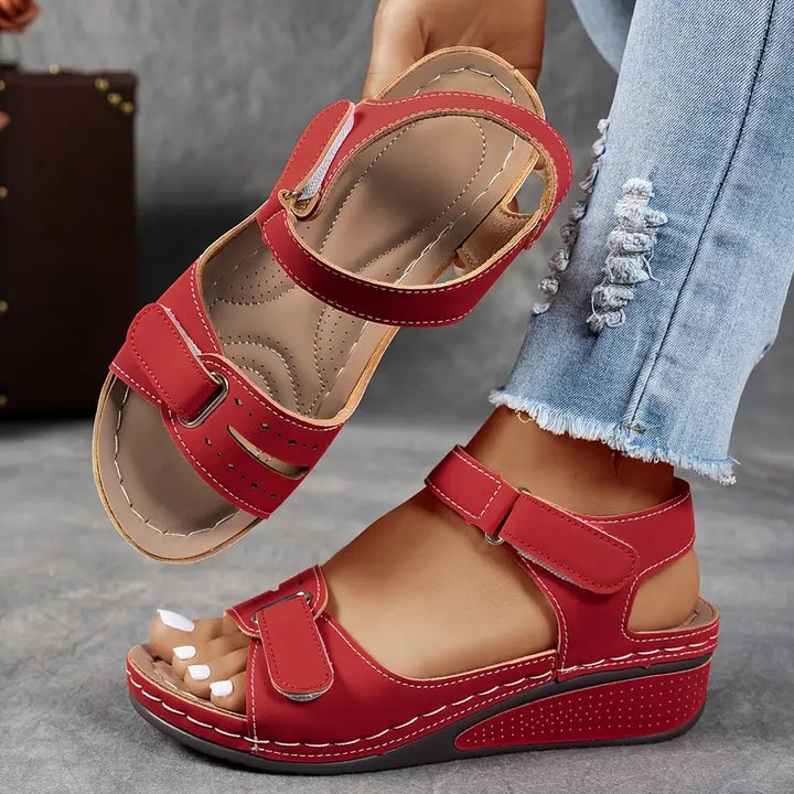 Stylish women's casual wedge sandals, featuring a contoured footbed and orthopedic comfort technology.