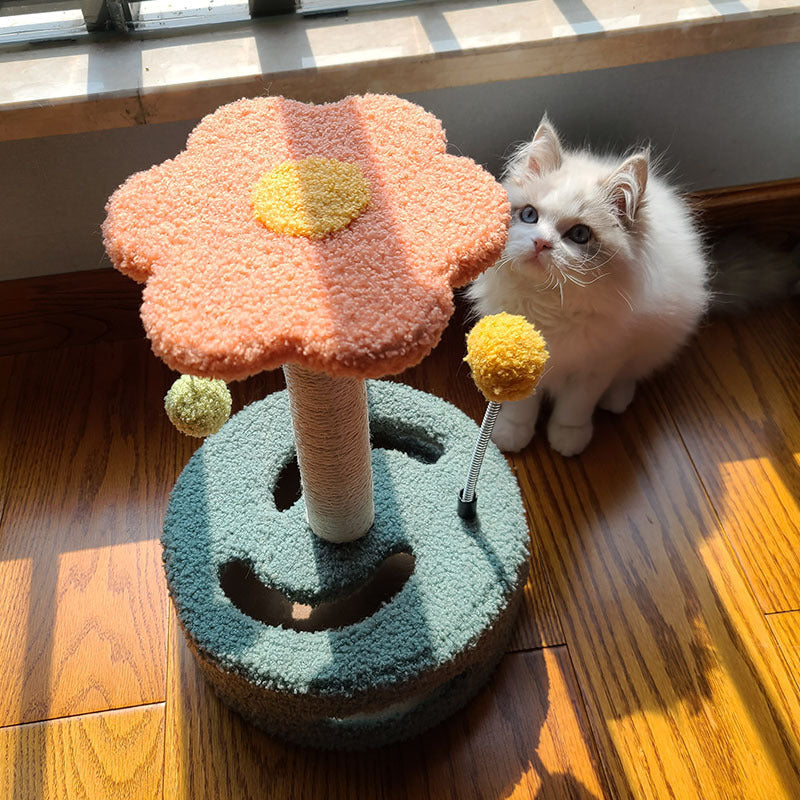 Engaging sunflower cat scratching post with sisal rope and interactive toy for hours of feline fun.