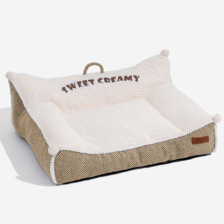 Top-down view of Sweet Creamy plush bolster dog bed, inviting pet comfort