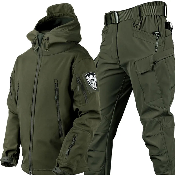 Taktische Outdoor-Jacke und Hose, wind- und wasserdicht, in Grau, ideal für Abenteuer, mit Kapuze und elastischem Bund.