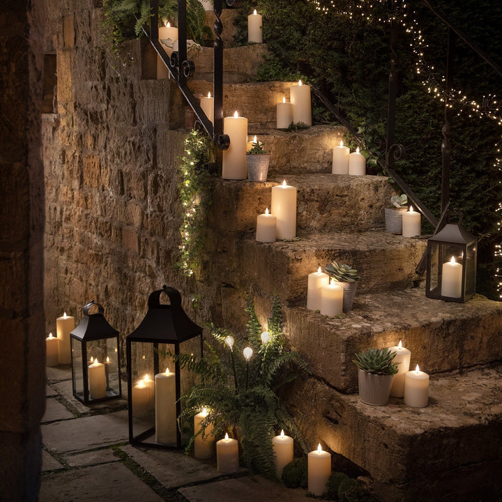 "Trio aus Solar Kerzen in unterschiedlichen Höhen, ideal für Gartenbeleuchtung, dekorativ und umweltfreundlich."