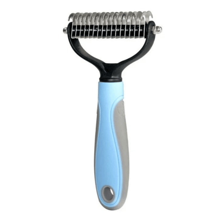 Close-up of the stainless steel pet dematting comb teeth, designed for effective deshedding and tangle removal.