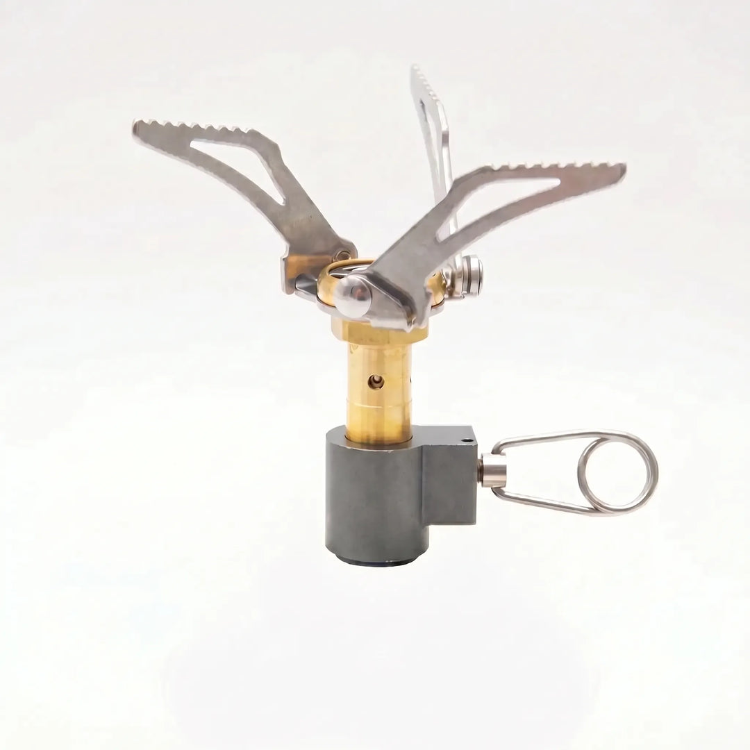 Compact folding gas stove, ultralight design for easy packing in backpacking & survival gear.