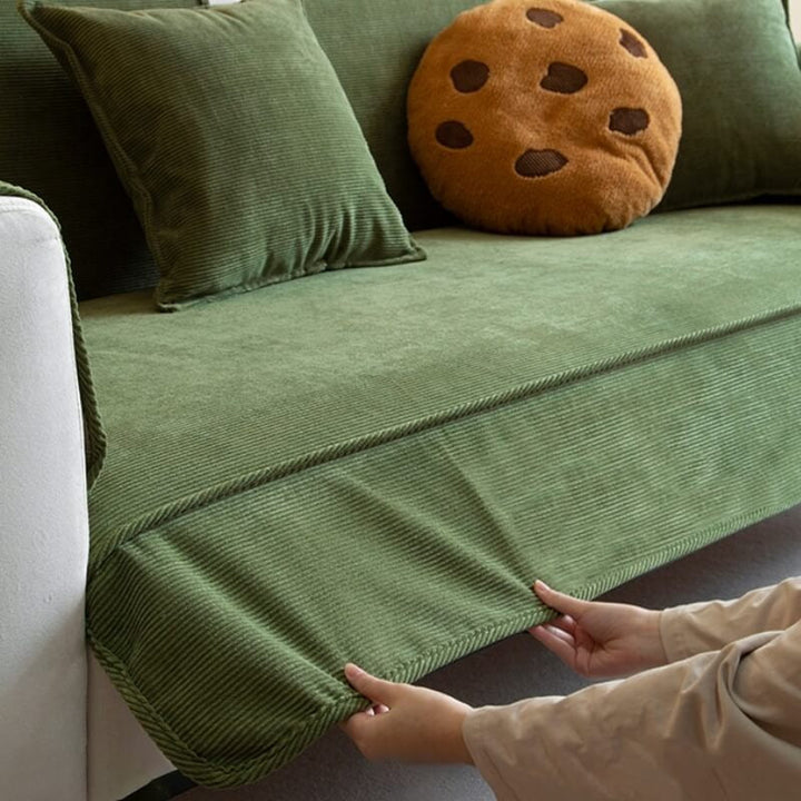Textured corduroy sofa cover, anti-slip design, ideal for pet owners, enhancing living room decor.