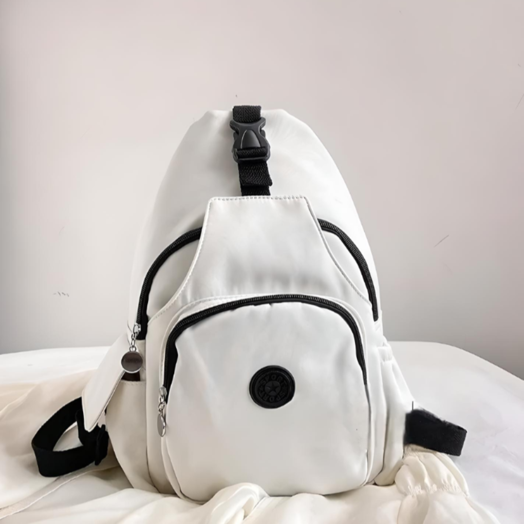 Unisex anti-theft sling backpack, sleek design, multiple compartments for secure daily commute & travel essentials.