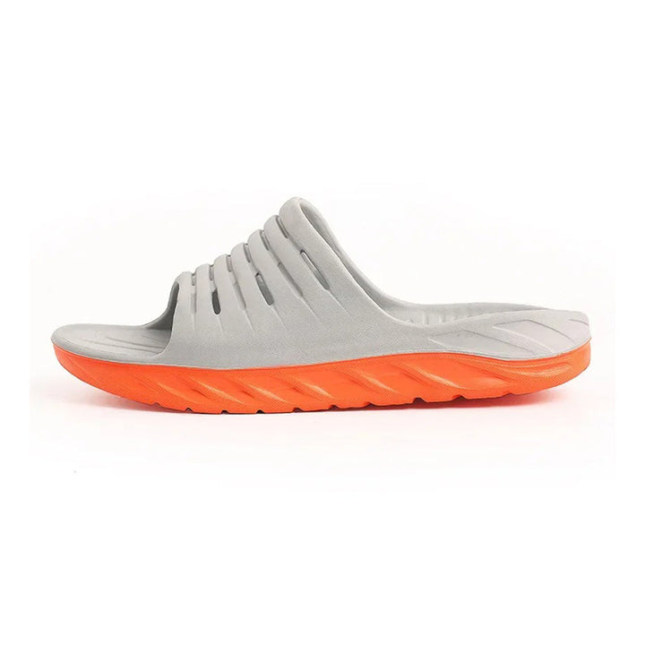 Versatile unisex arch support slides; orthopedic house slippers & walking sandals for daily wear and comfort.