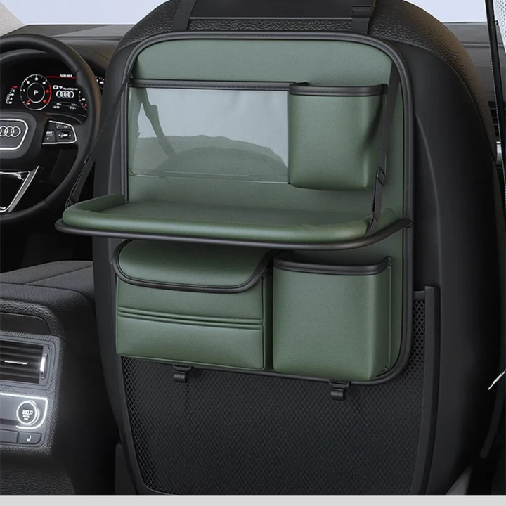 Car seat back organizer in use with tablet holder, cup holder, and open foldable tray for road trip dining