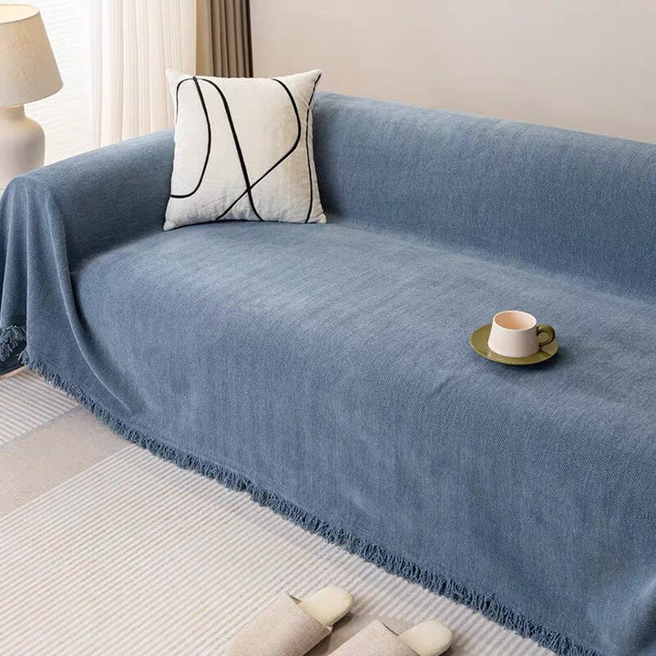Full view of living room with chenille herringbone couch cover, elegant and pet-friendly sofa protector