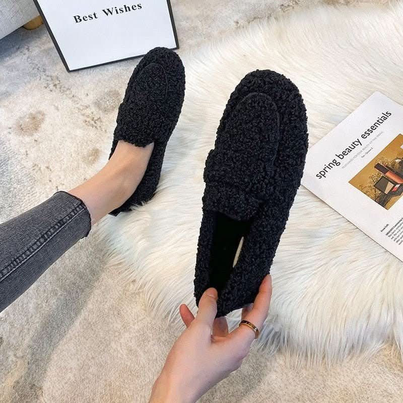 Premium cozy unisex winter house slippers for ultimate warmth & comfort. Non-slip indoor footwear for relaxation.