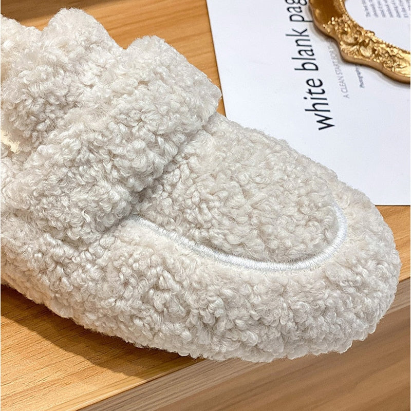Soft unisex fall winter slippers providing cozy warmth for indoor use and home comfort.