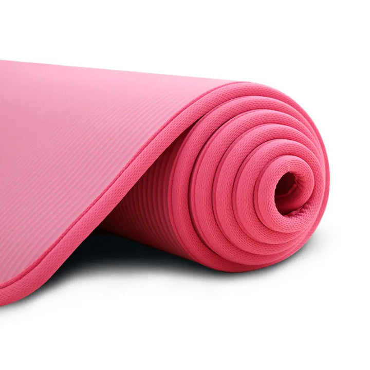 Blue extra thick non-slip exercise mat for yoga & pilates, offering cushioned support for comfortable fitness.