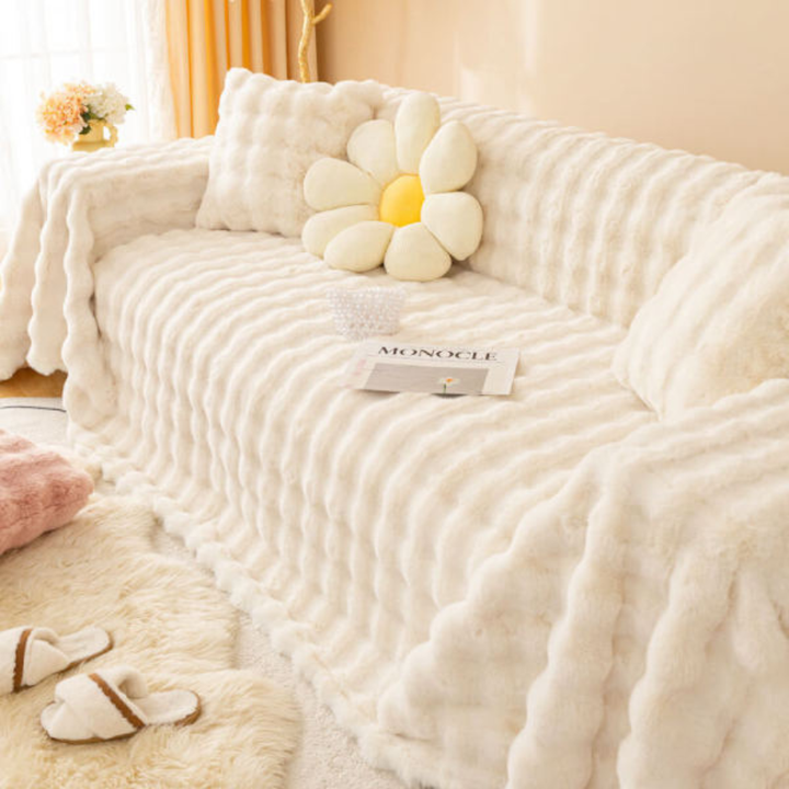 Luxury faux rabbit fur sofa cover in a neutral tone, cozy plush pet-friendly couch protector