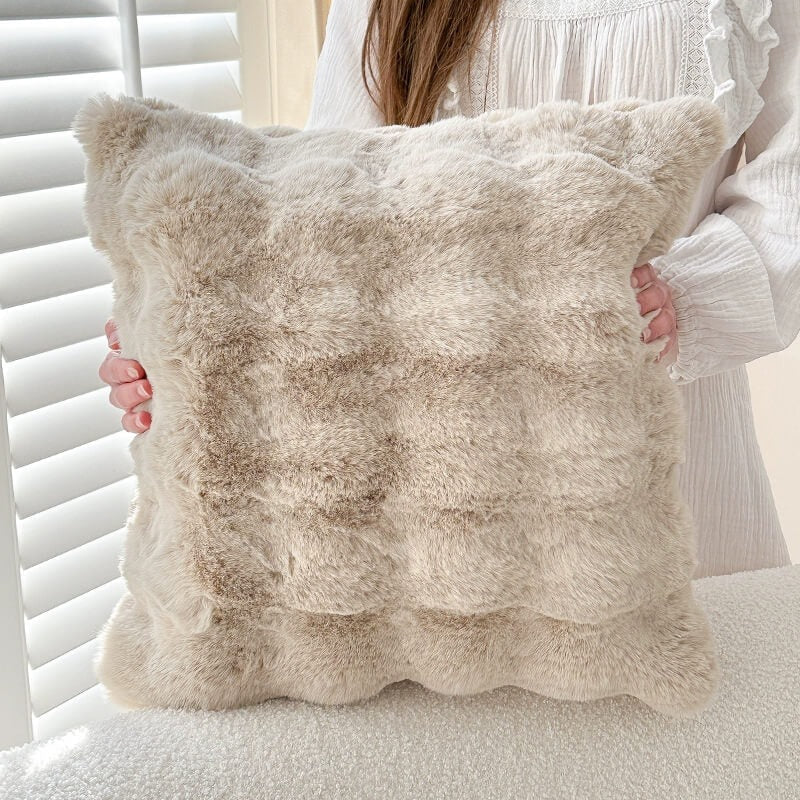 Stylish plush faux fur sofa cover in a modern interior, providing pet protection and warmth