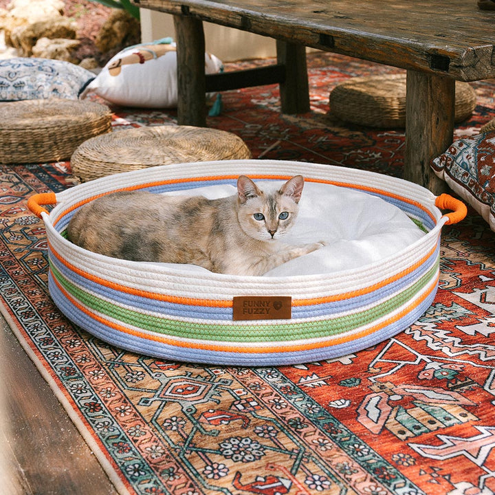 Neutral-toned striped pet bed, handcrafted to blend with any interior
