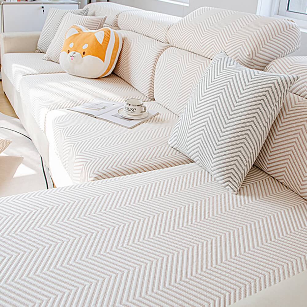 Lifestyle image of a family enjoying a sofa with a cool and comfortable ice silk stretch cover.