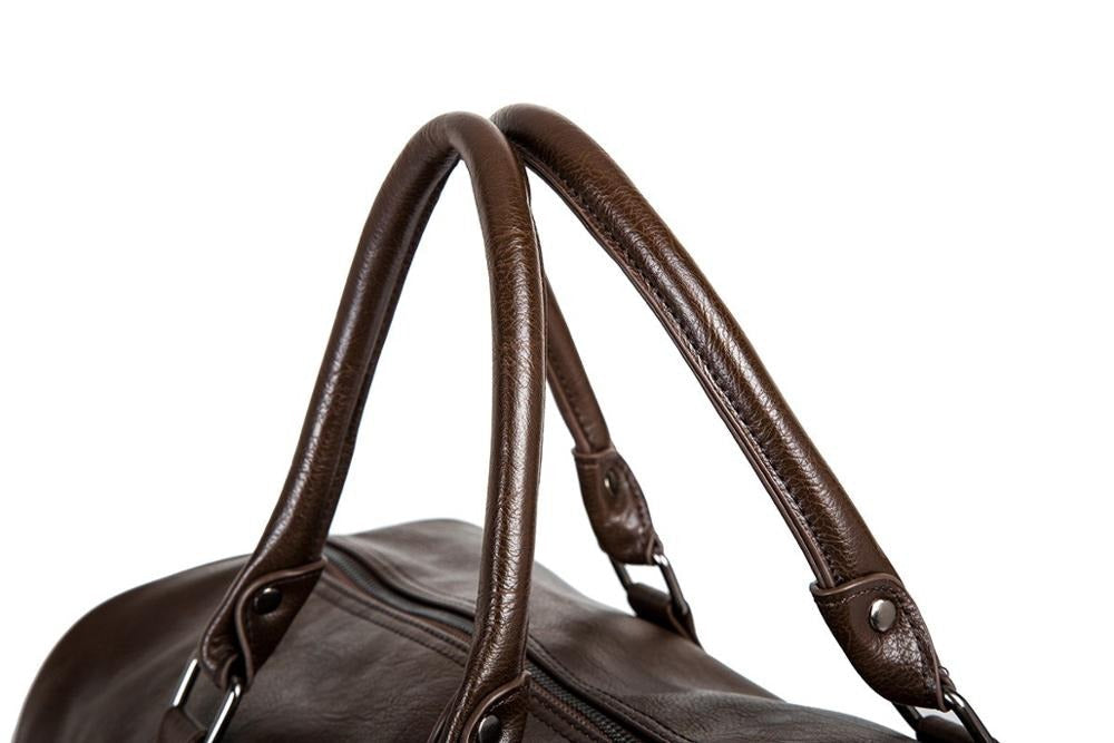 Premium brown faux leather travel duffel for men & women, spacious carry-on luggage.