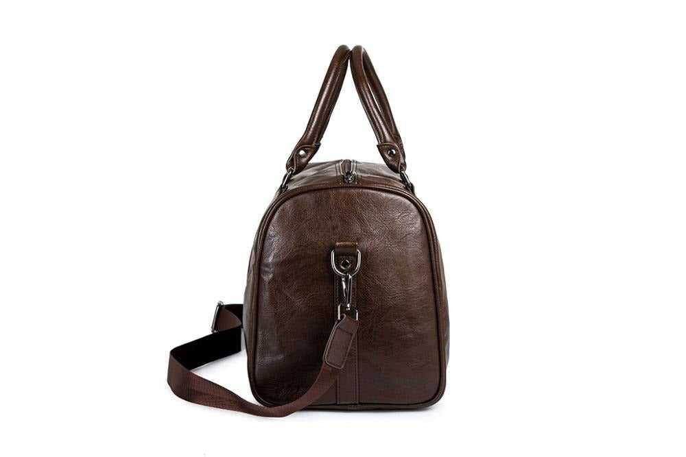 Chic brown unisex travel duffel, a roomy faux leather carry-on for stylish journeys.