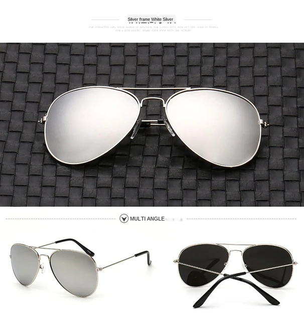 Sleek luxury aviator sunglasses with polarized lenses, perfect for travel essentials & glare reduction.