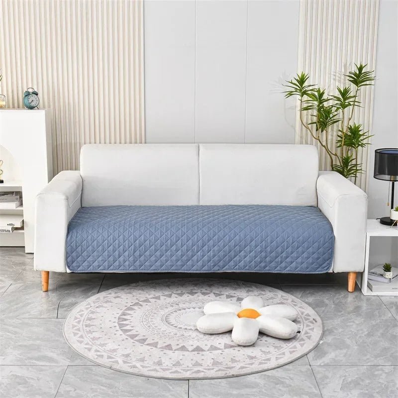 Folded pet incontinence blanket, compact and ready for use as a furniture protector