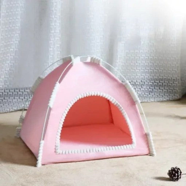 Foldable pop-up cat tent for easy travel, providing a safe pet shelter anywhere.