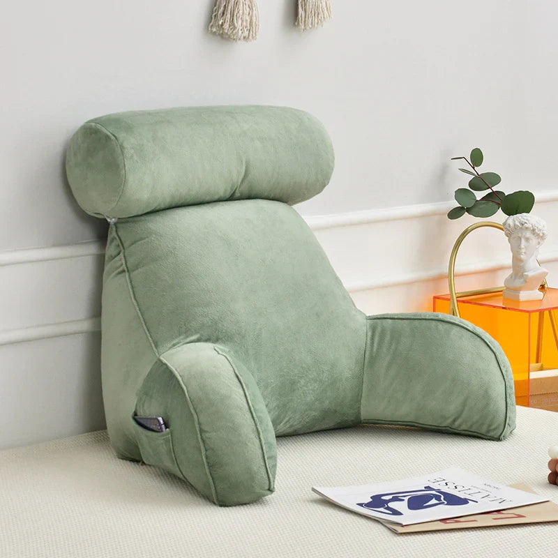Home comfort reading pillow, plush with arm & back support, perfect for cozy relaxation.