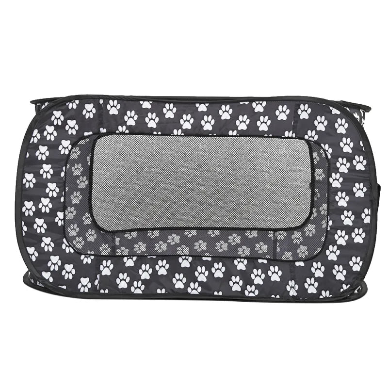 Collapsible fabric dog crate with fun paw patterns, ensuring a comfortable spot for your furry friend.