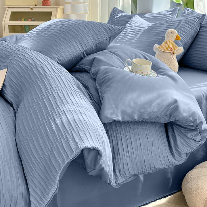 Easy care seersucker bedding set in a classic navy solid color, a timeless addition to bedroom decor.