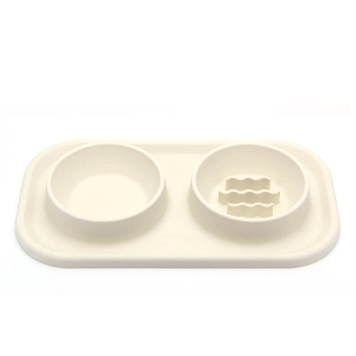 Double pet bowl in grey silicone, featuring a slow feeder design for dogs and cats, non-slip base.