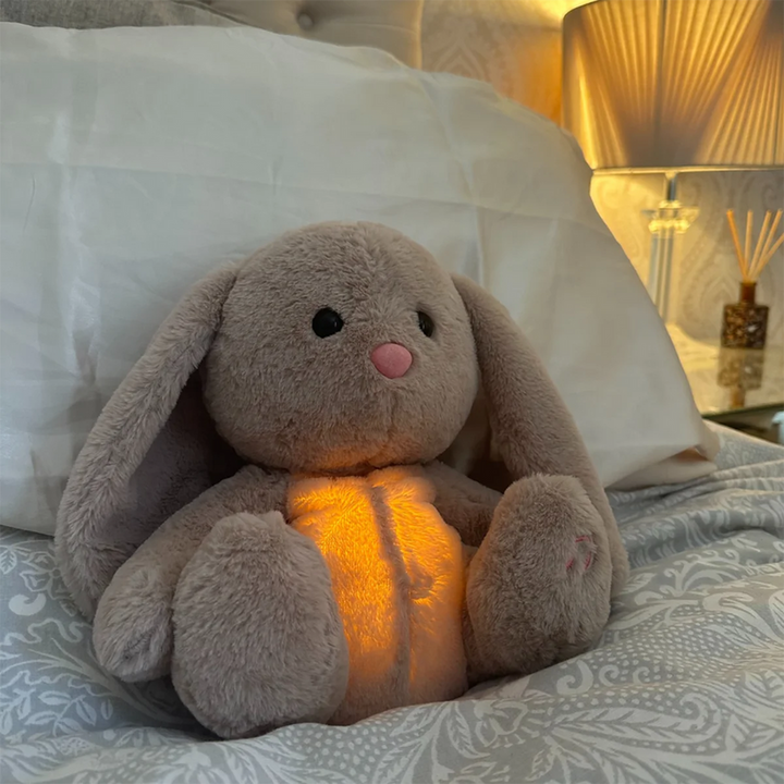 Plush, soft soothing toy with a gentle, calming light for comfort and relaxation, a perfect stress relief aid.