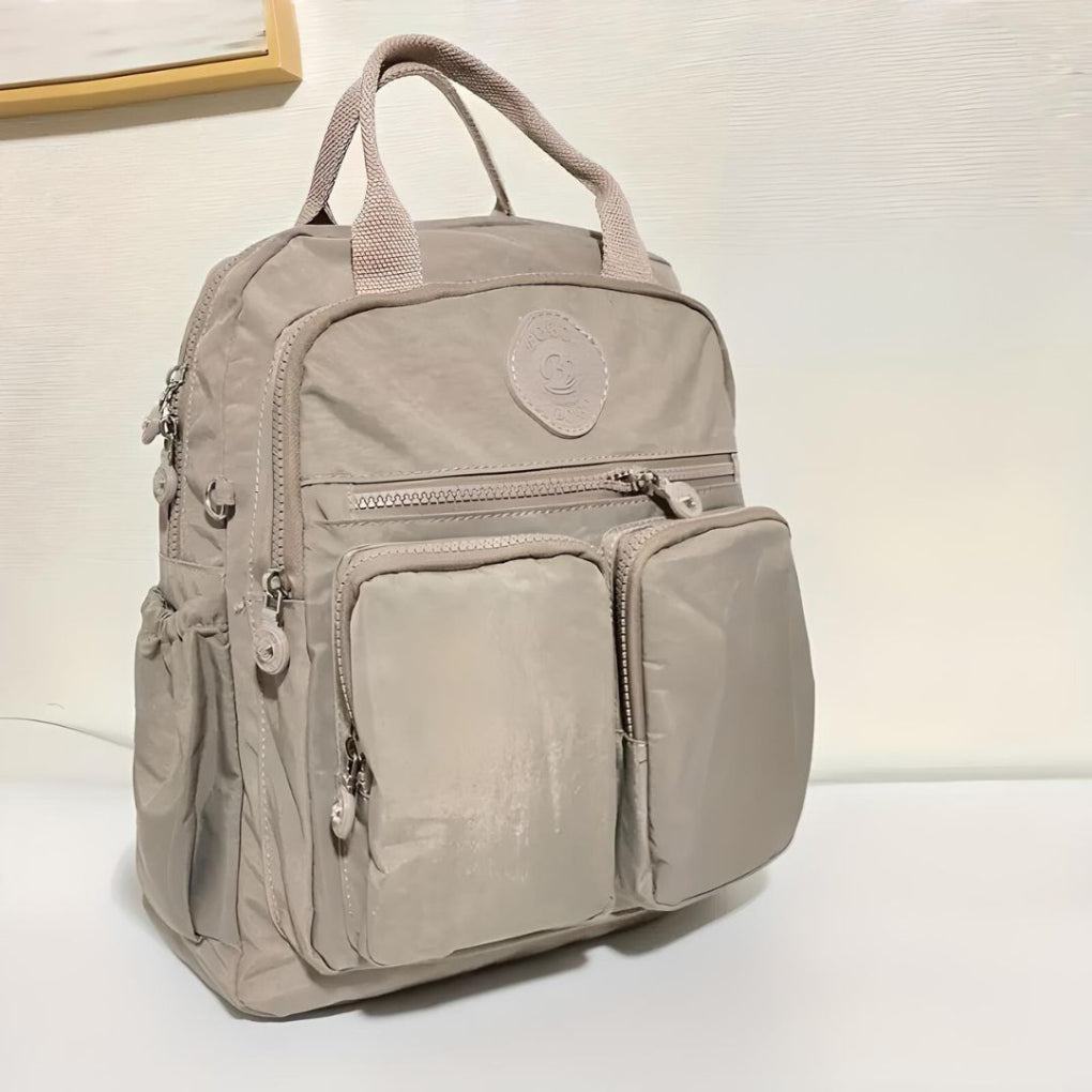 Stylish waterproof urban backpack for daily carry, featuring multi-pockets for organization.