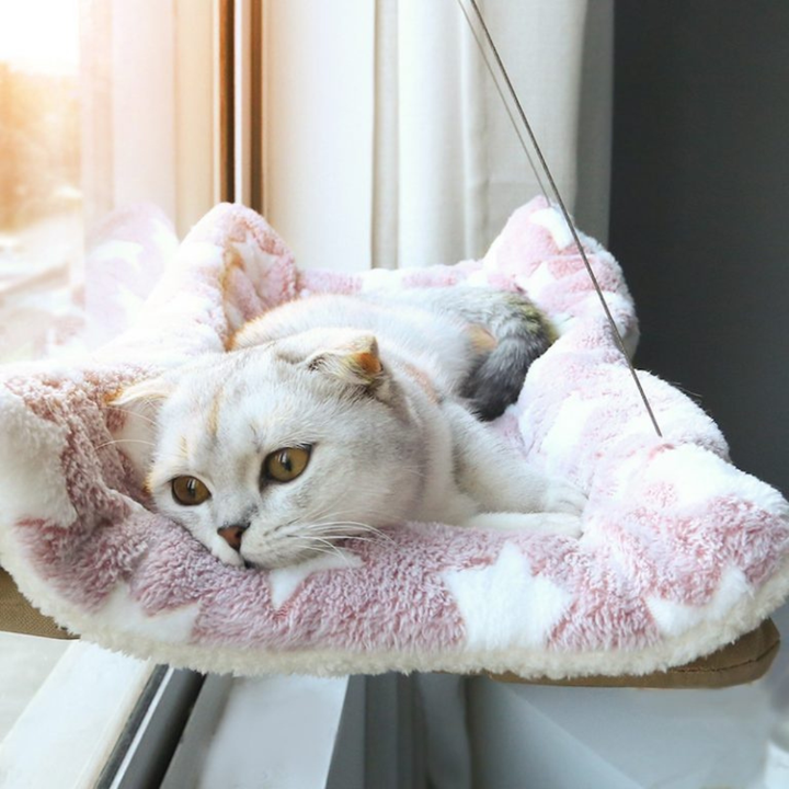Unisex window-mounted cat hammock perch with strong suction cups, offering an elevated bed view for cats.