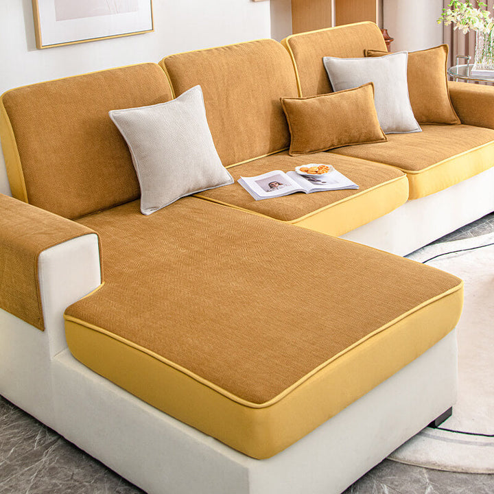 Close-up of chenille herringbone fabric on a universal stretch couch cover, showcasing texture