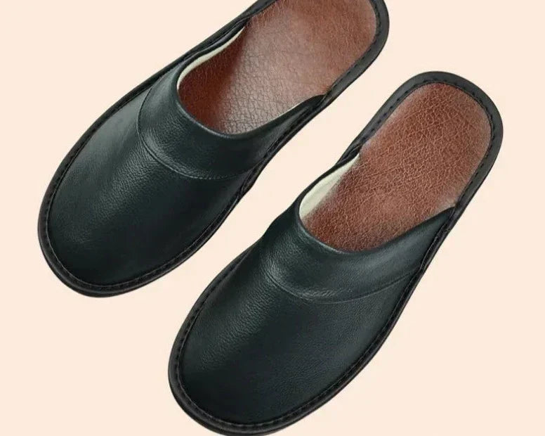 Men's black ultra-comfort slip-on house slippers for ultimate indoor relaxation.