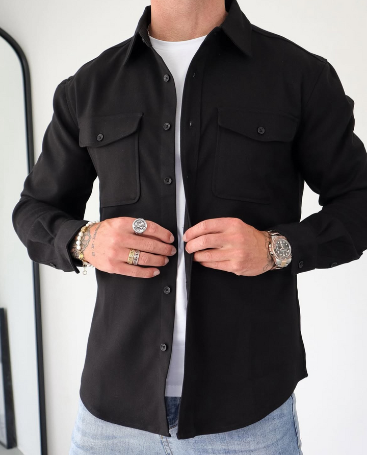 Dark blue men's stretch overshirt featuring chest pockets; a versatile button-up top for all-season men's fashion.