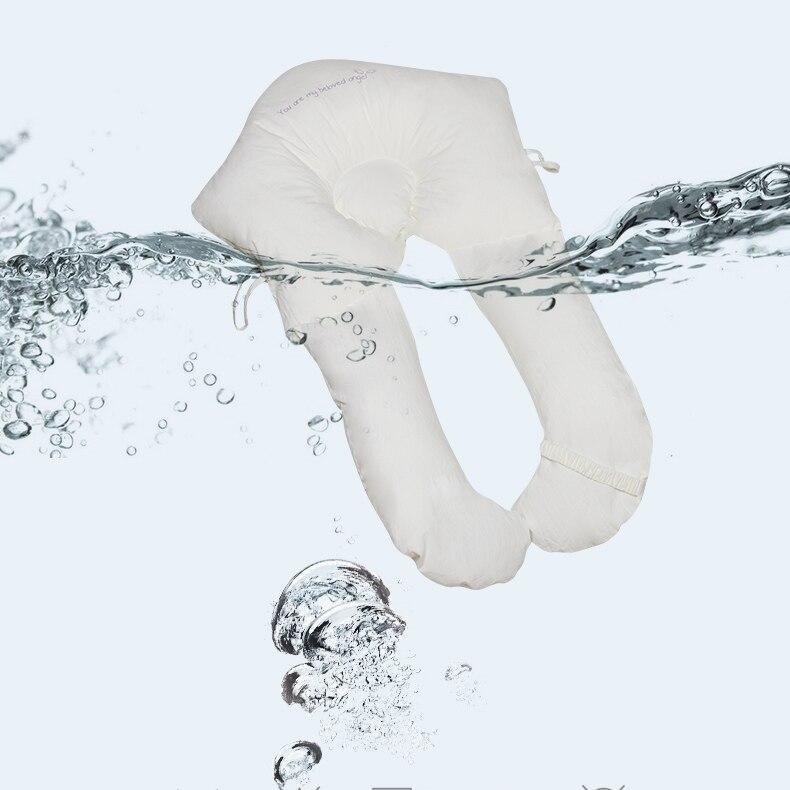 "Verstellbares U-förmiges Baby-Kissen aus Bio-Baumwolle, weich, hautfreundlich, bietet Nackenstütze für sicheren Babyschlaf."