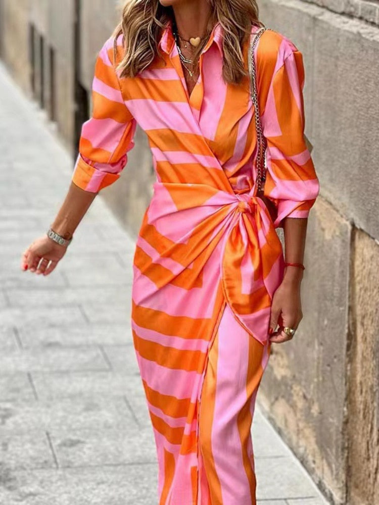 Chic women's printed wrap dress. Effortless summer fashion with a vibrant design.