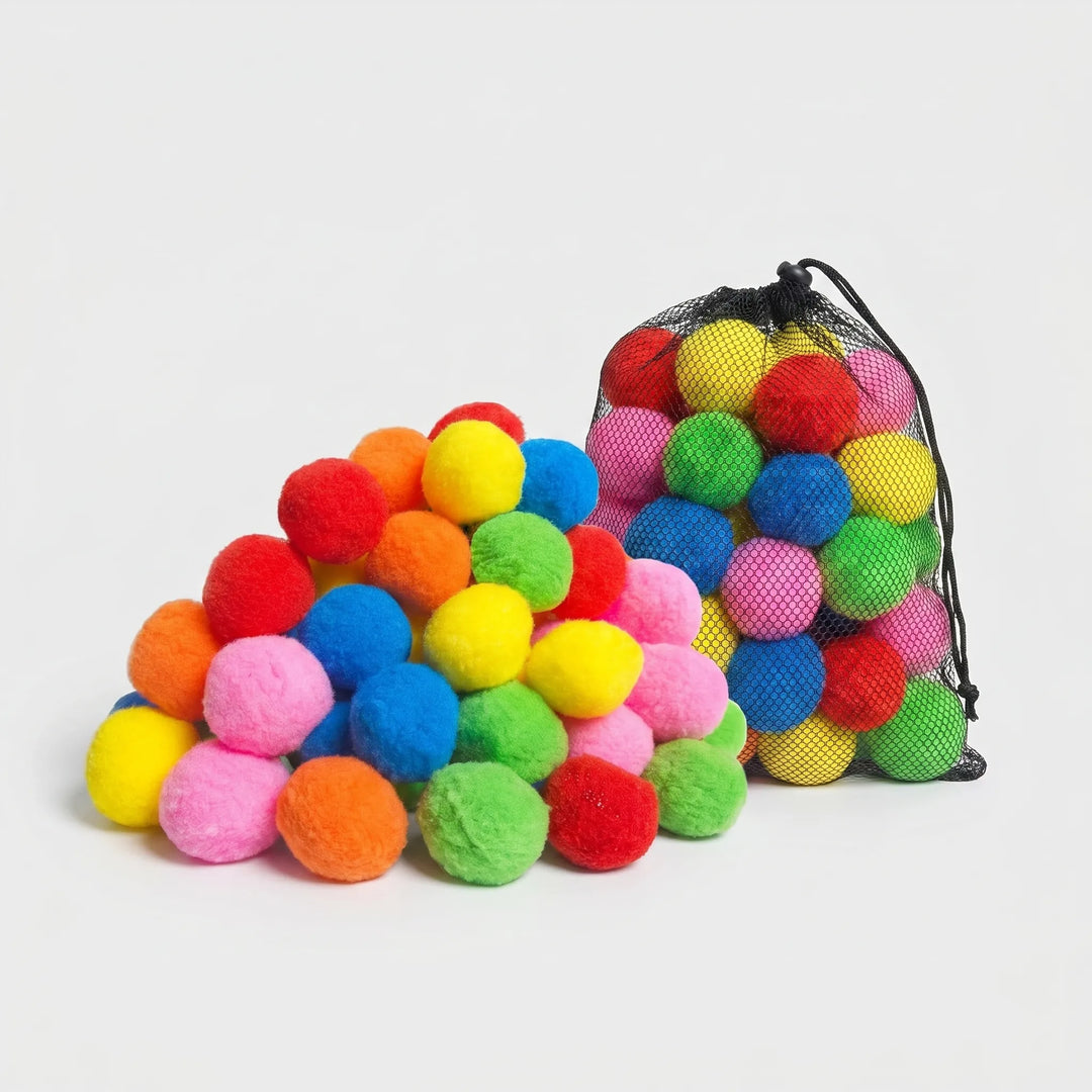 Kids playing with colorful reusable water splash balls at the beach, great for summer family fun.