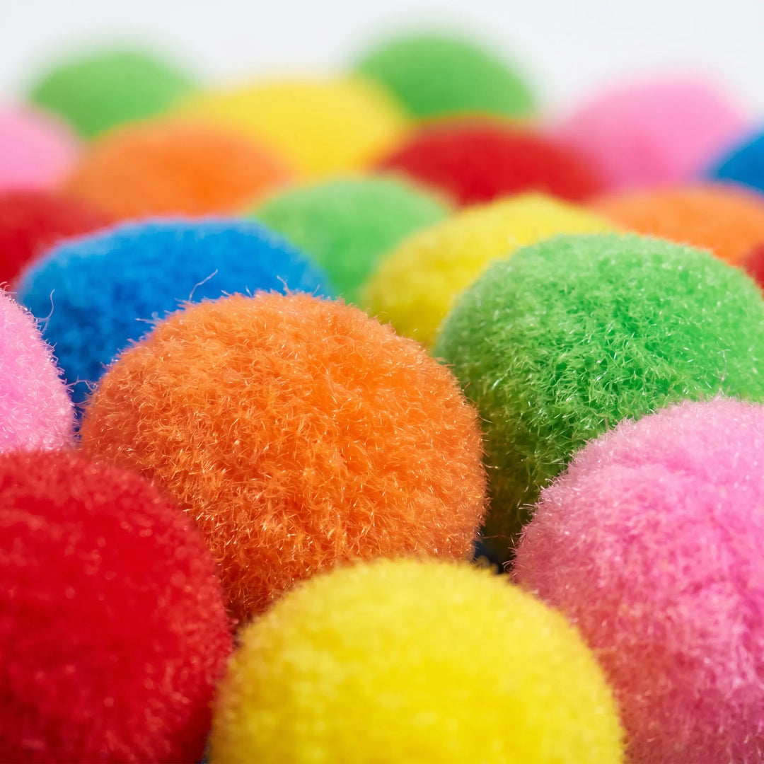 Assorted colorful reusable splash balls, an eco-friendly water toy for outdoor parties and beach play.