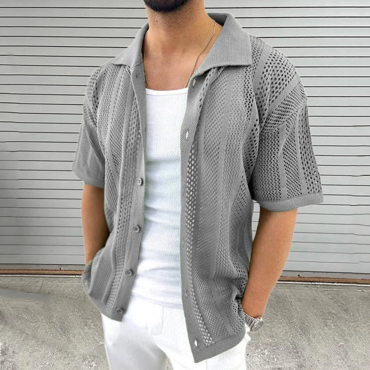 Men's vintage short-sleeve button shirt with intricate hollow design, a stylish choice for summer fashion & vacations.