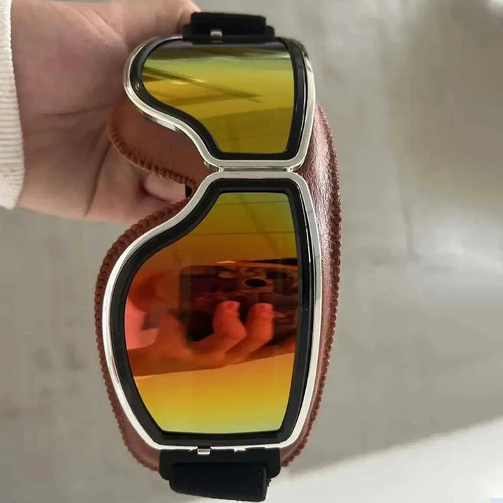 "Vintage Motorradbrille mit UV-Schutz, klassisches Design, braune Linsen, faltbar, verstellbares Band, kratzfest."