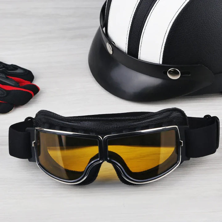 "Vintage Motorradbrille mit UV-Schutz, klassisches Design, braune Linsen, faltbar, verstellbares Band, kratzfest."