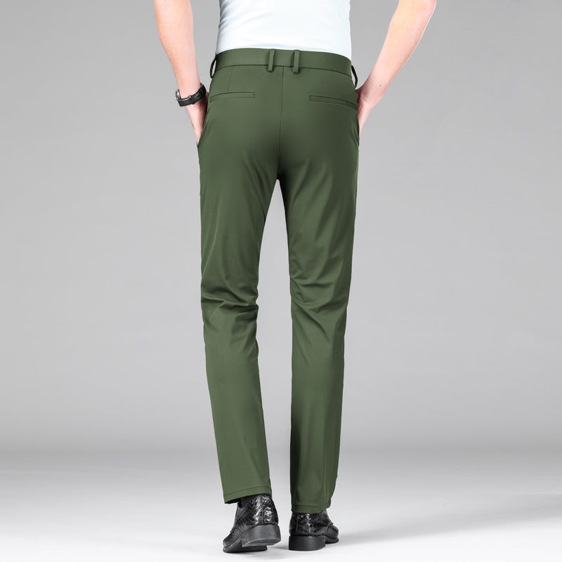 Man wearing modern slim fit performance trousers, showcasing their smart casual look.
