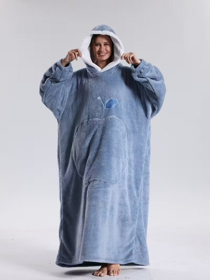 Cozy unisex hoodie blanket, ideal winter accessory for snuggling indoors.
