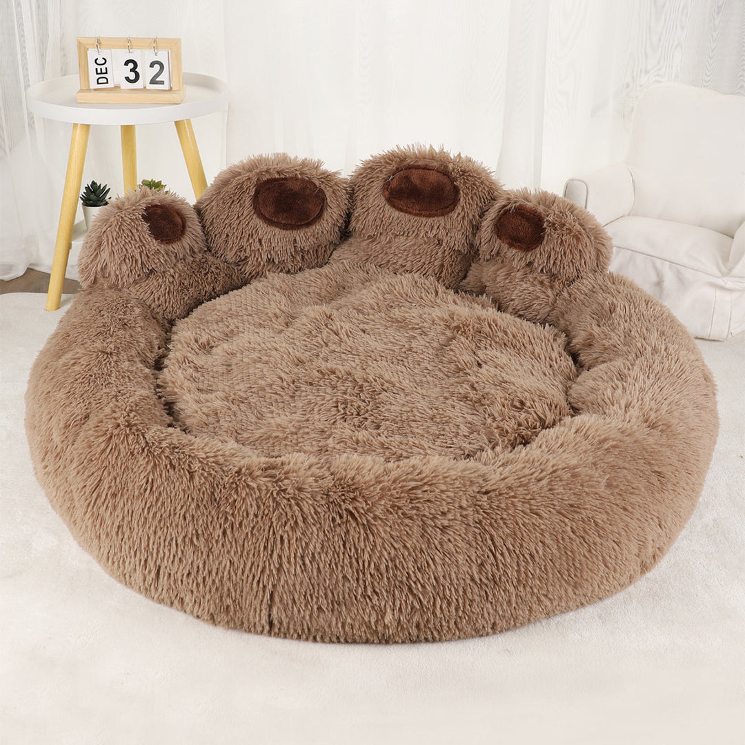 Comfortable round cat or dog bed, washable and plush, ideal for small to medium furry friends.